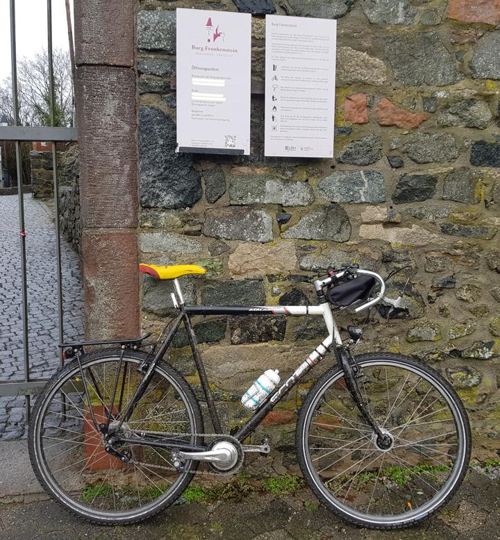 Frankenstein leaning at the castle wall of Burg Frankestein